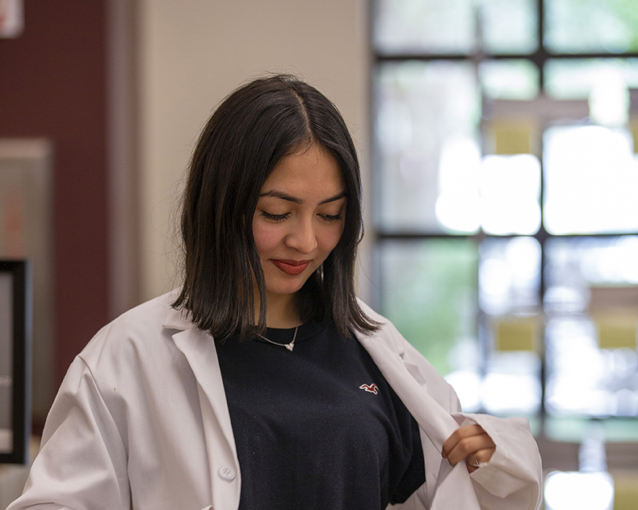 Student Trying on Labcoat