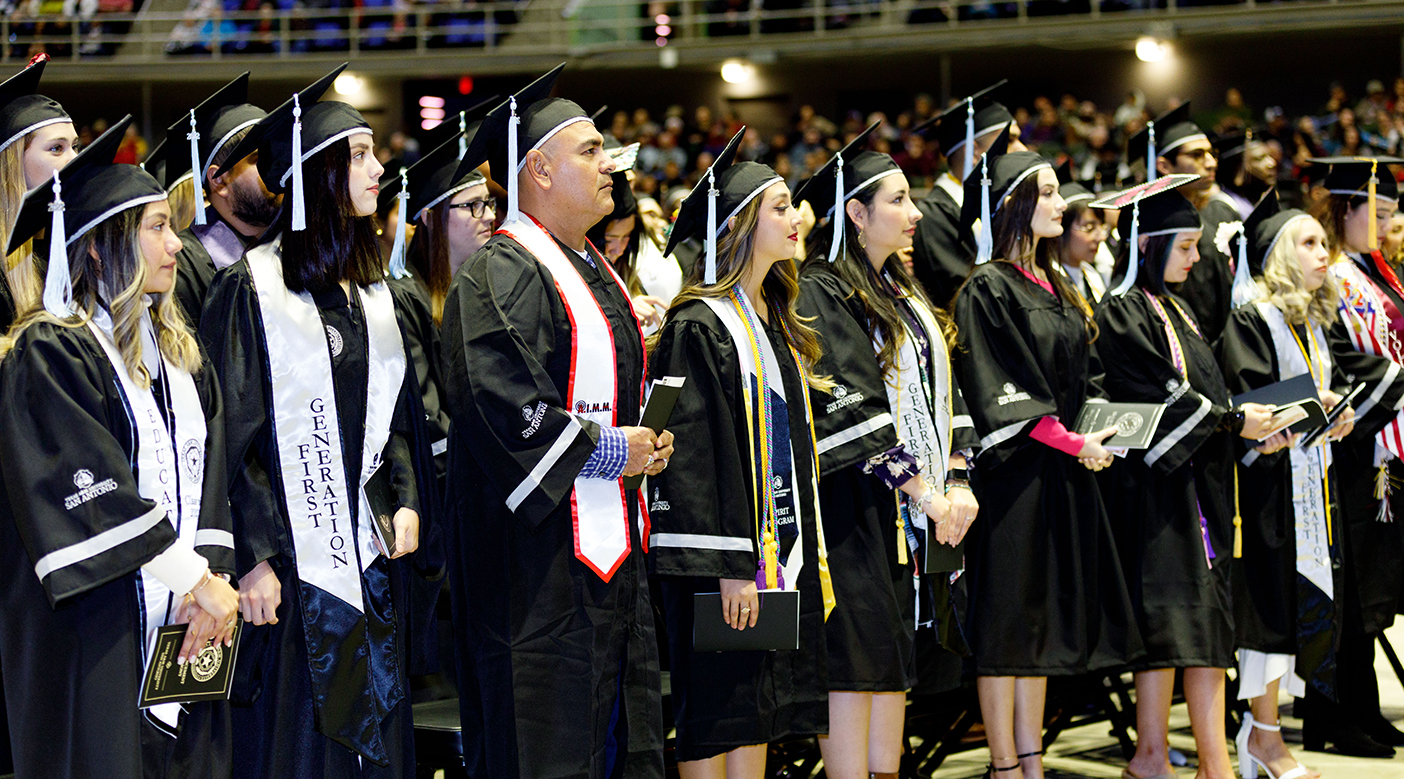 Students Standing During Commencement Ceremony